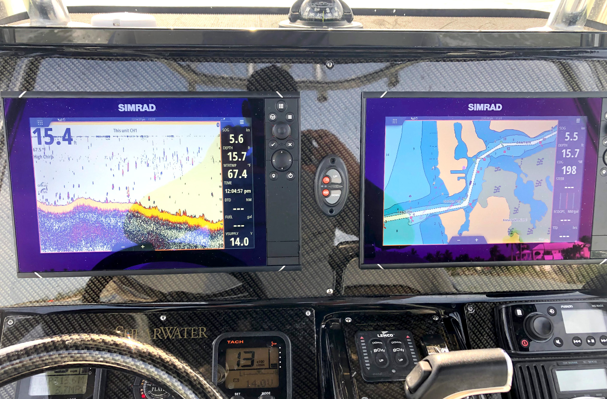 A&M Electronics services showing two gps units showing you the location and depth for fishing