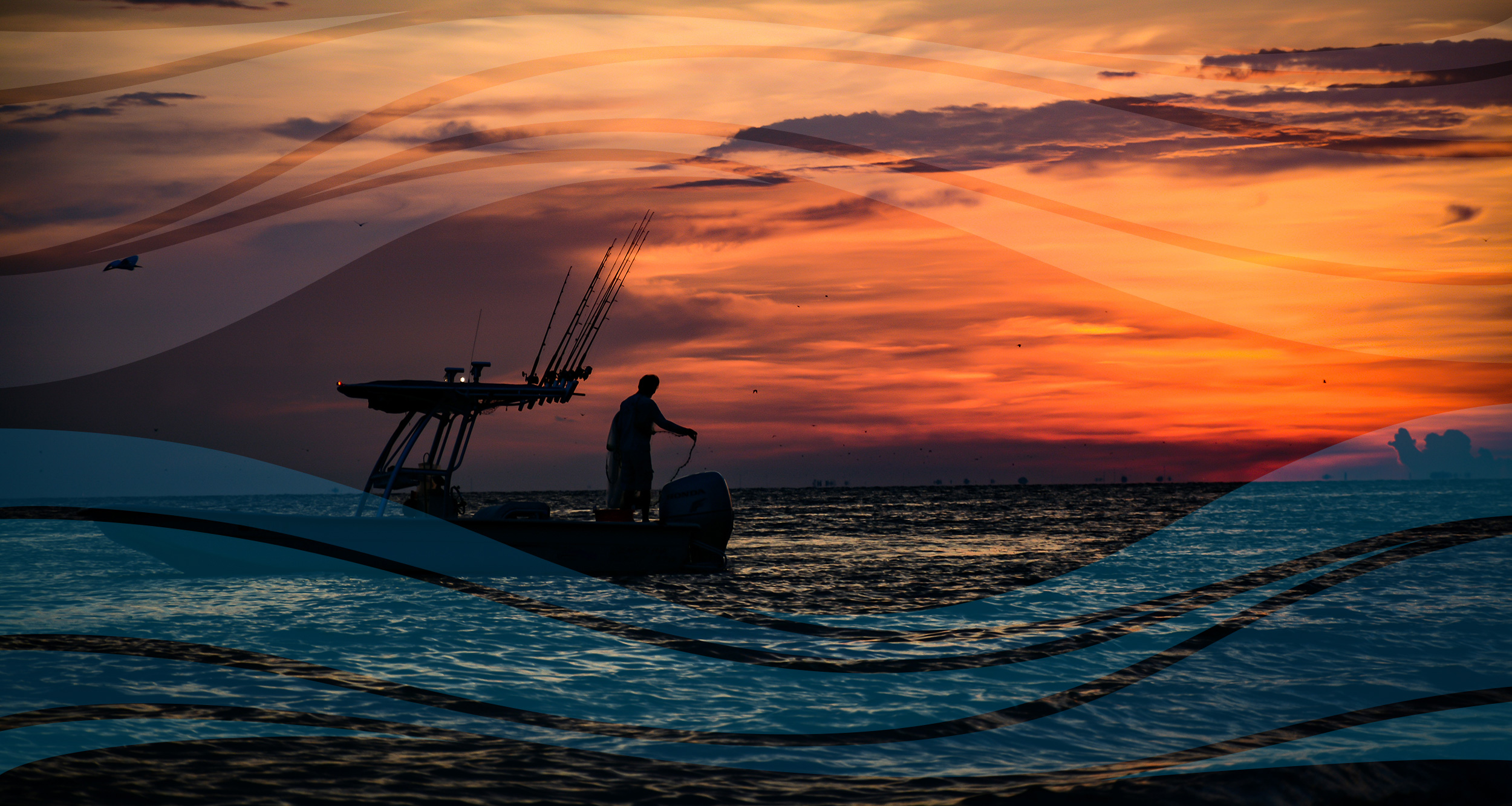 Shows evening boating with a sunset behind a man setting anchor over his outboard motor serviced by A&M Marine
